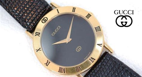 MENS GUCCI 3000M GOLD TONE BLACK DIAL ROMAN 